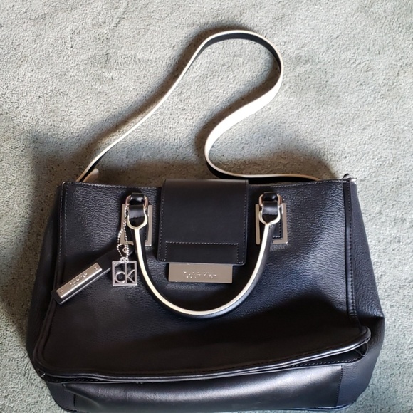 Calvin Klein Handbags - EUC Calvin Klein black/white leather tote bag